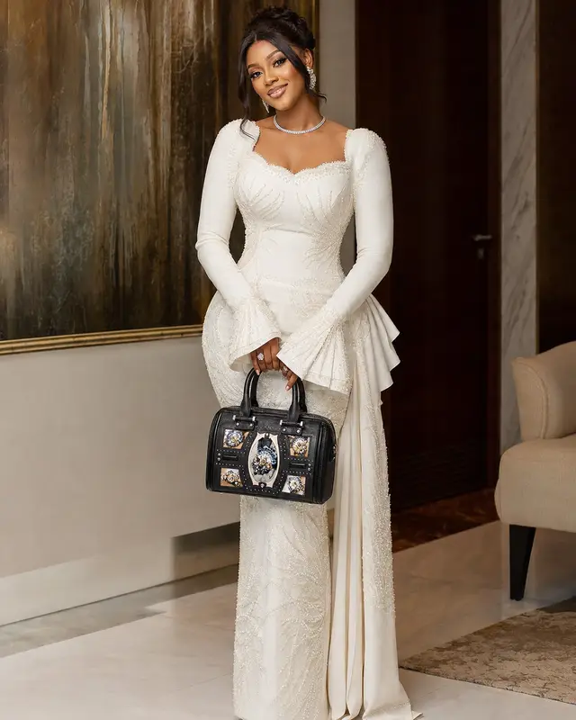 Midnight Testament carried with a white gown.